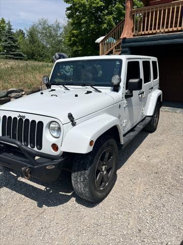 used 2012 Jeep Wrangler Unlimited car, priced at $12,526