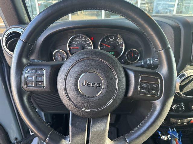 used 2015 Jeep Wrangler Unlimited car, priced at $19,518