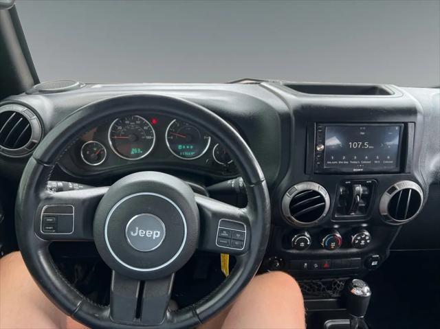 used 2015 Jeep Wrangler Unlimited car, priced at $14,950