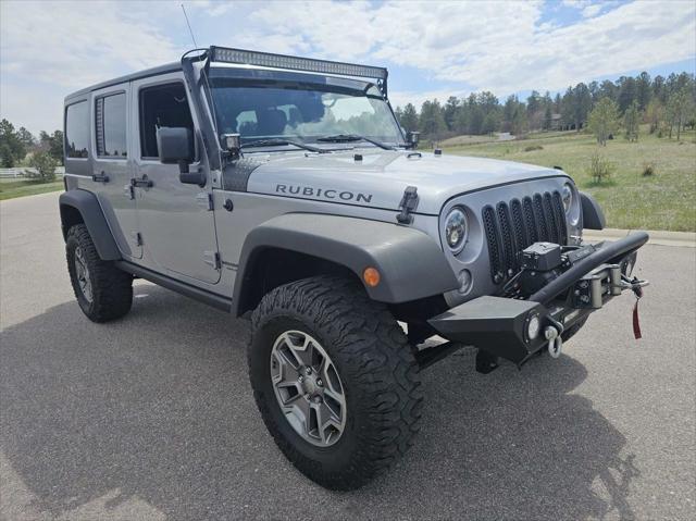 used 2014 Jeep Wrangler Unlimited car, priced at $22,100