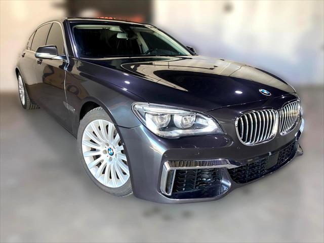 used 2013 BMW 750 car, priced at $14,749