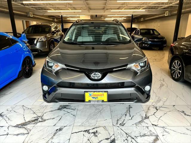 used 2018 Toyota RAV4 car, priced at $17,998