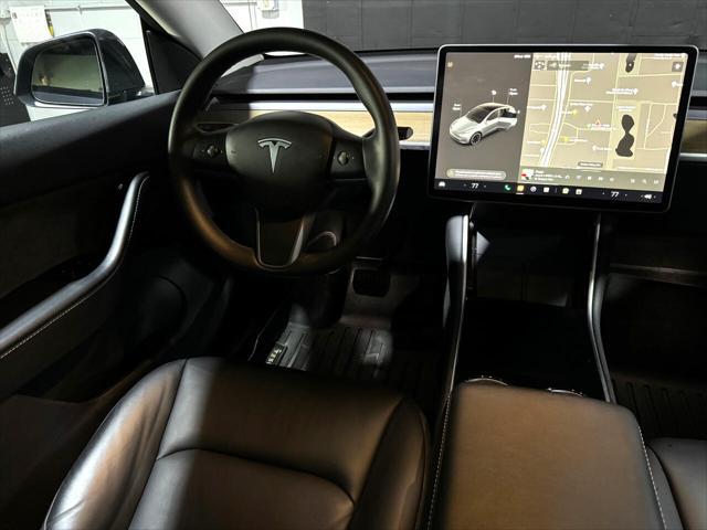 used 2021 Tesla Model Y car, priced at $27,777