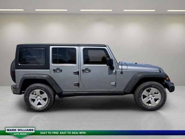 used 2013 Jeep Wrangler Unlimited car, priced at $15,982