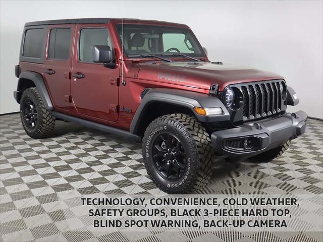 used 2021 Jeep Wrangler Unlimited car, priced at $27,119