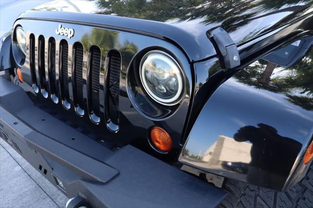 used 2013 Jeep Wrangler Unlimited car, priced at $13,862