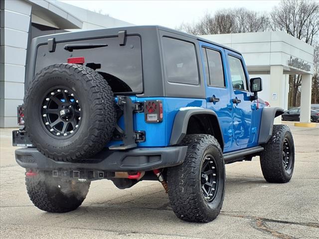 used 2016 Jeep Wrangler Unlimited car, priced at $20,769