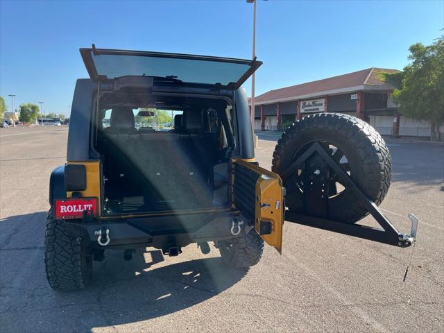 used 2014 Jeep Wrangler Unlimited car, priced at $22,500