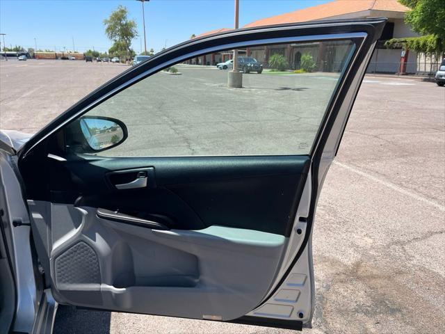 used 2013 Toyota Camry car, priced at $12,900