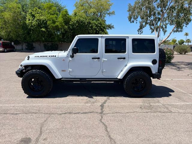 used 2013 Jeep Wrangler Unlimited car, priced at $23,995