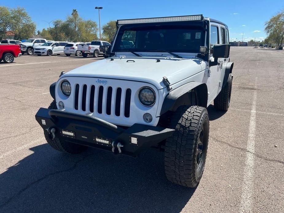 used 2014 Jeep Wrangler Unlimited car, priced at $17,990
