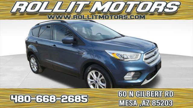 used 2018 Ford Escape car, priced at $13,900