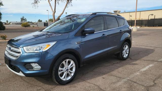 used 2018 Ford Escape car, priced at $13,900