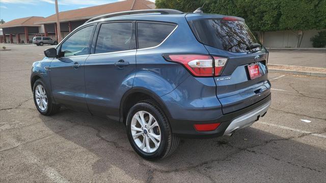 used 2018 Ford Escape car, priced at $13,900