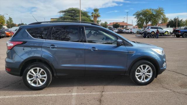 used 2018 Ford Escape car, priced at $13,900