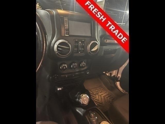 used 2016 Jeep Wrangler Unlimited car, priced at $15,497