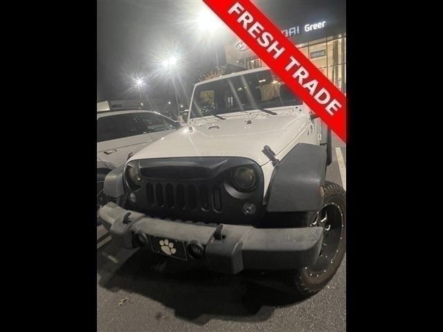 used 2016 Jeep Wrangler Unlimited car, priced at $15,497