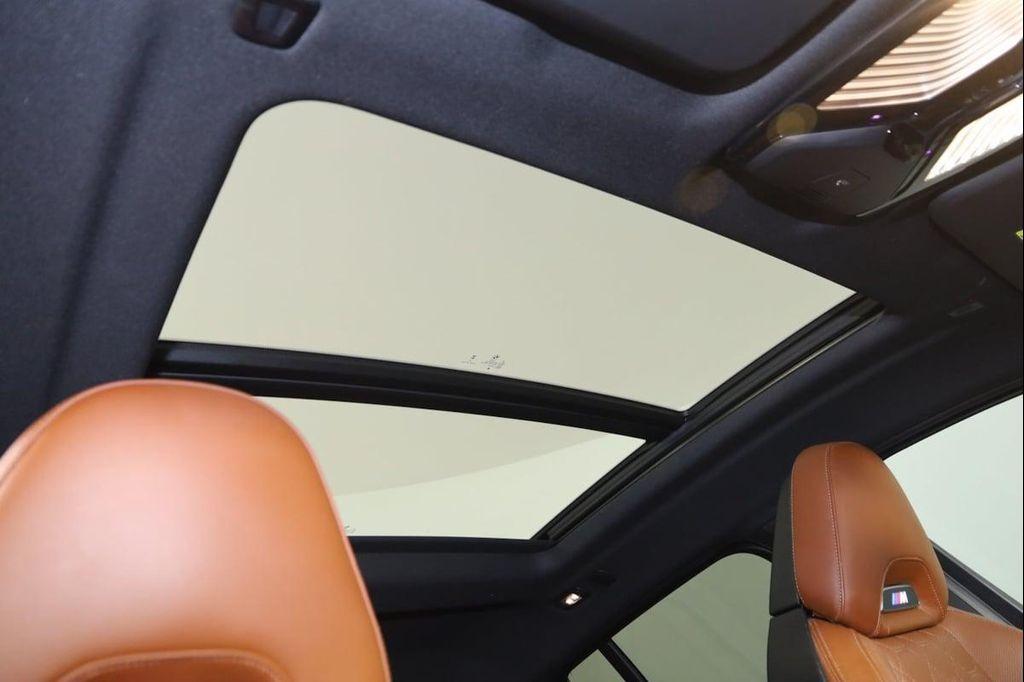 used 2023 BMW X4 M car, priced at $65,000