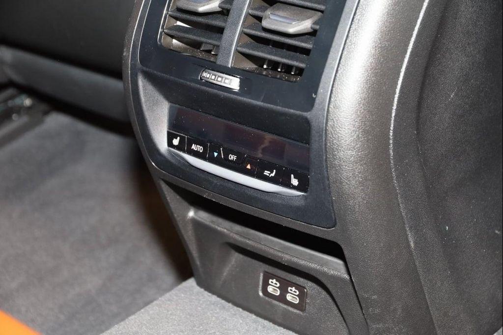 used 2023 BMW X4 M car, priced at $65,000