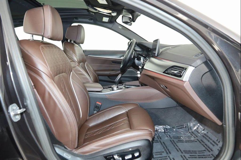 used 2023 BMW M550 car, priced at $61,990