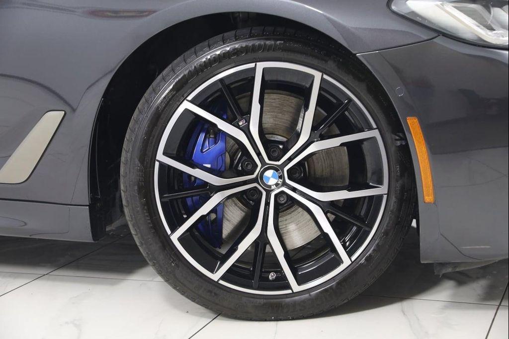 used 2023 BMW M550 car, priced at $61,990