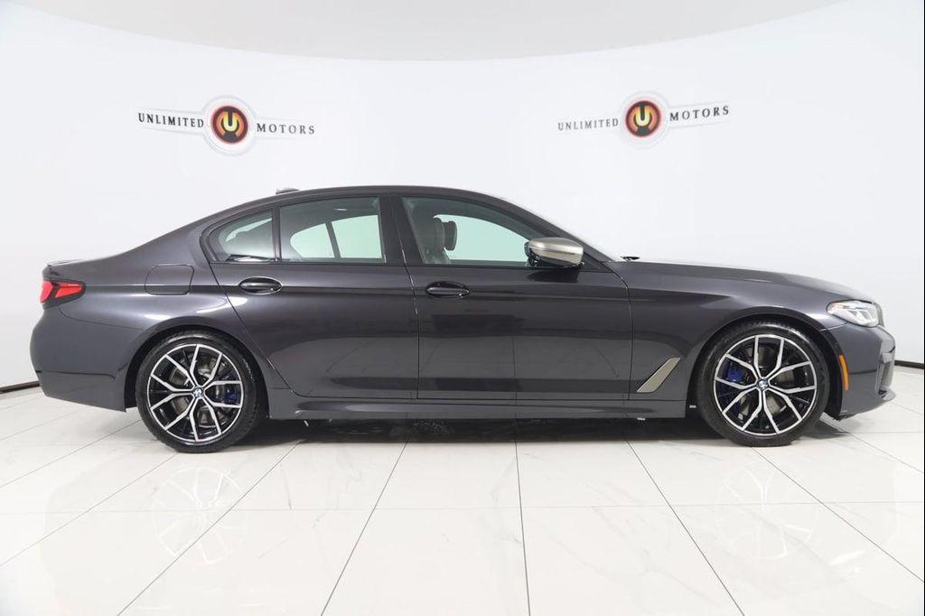 used 2023 BMW M550 car, priced at $61,990