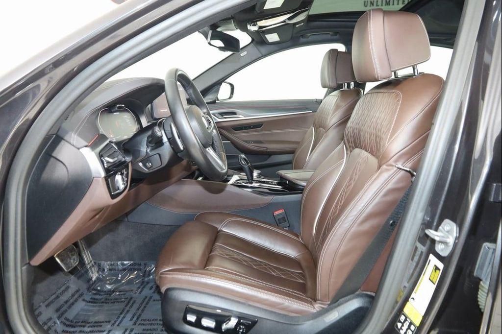 used 2023 BMW M550 car, priced at $61,990