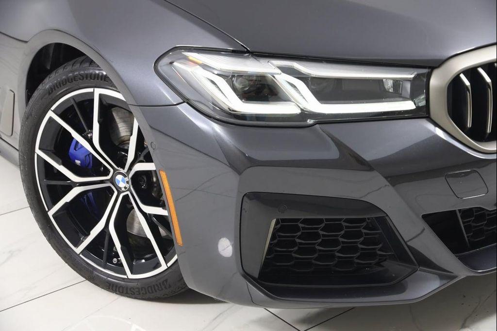 used 2023 BMW M550 car, priced at $61,990