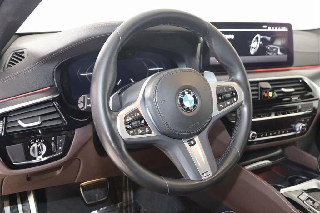 used 2023 BMW M550 car, priced at $61,990