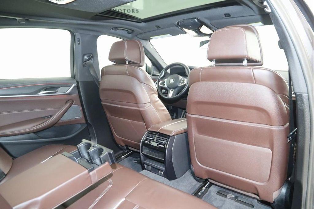 used 2023 BMW M550 car, priced at $61,990