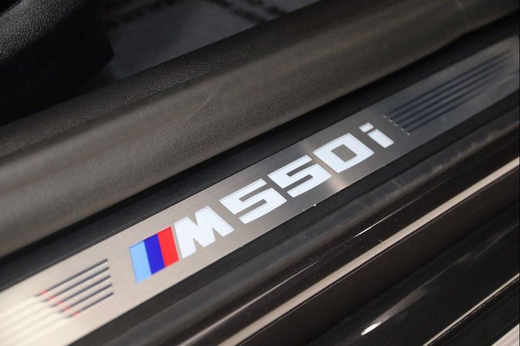 used 2023 BMW M550 car, priced at $61,990