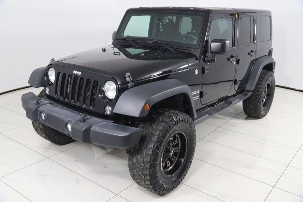 used 2014 Jeep Wrangler Unlimited car, priced at $13,500