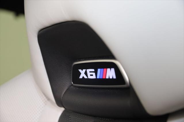 used 2024 BMW X6 M car, priced at $115,000