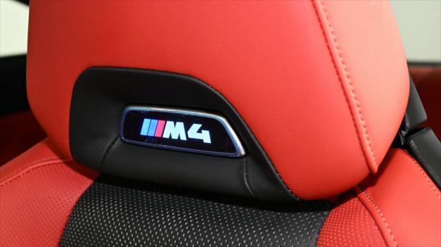 used 2023 BMW M4 car, priced at $74,000