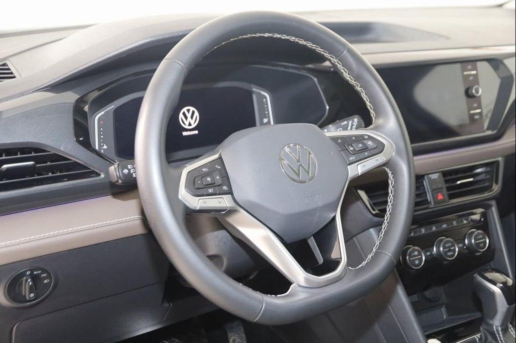 used 2023 Volkswagen Taos car, priced at $24,700