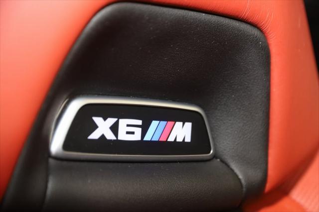 used 2022 BMW X6 M car, priced at $79,990