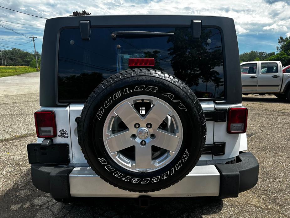 used 2011 Jeep Wrangler Unlimited car, priced at $11,900