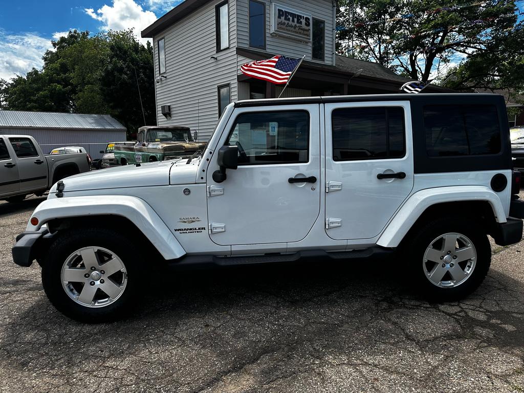 used 2011 Jeep Wrangler Unlimited car, priced at $11,900