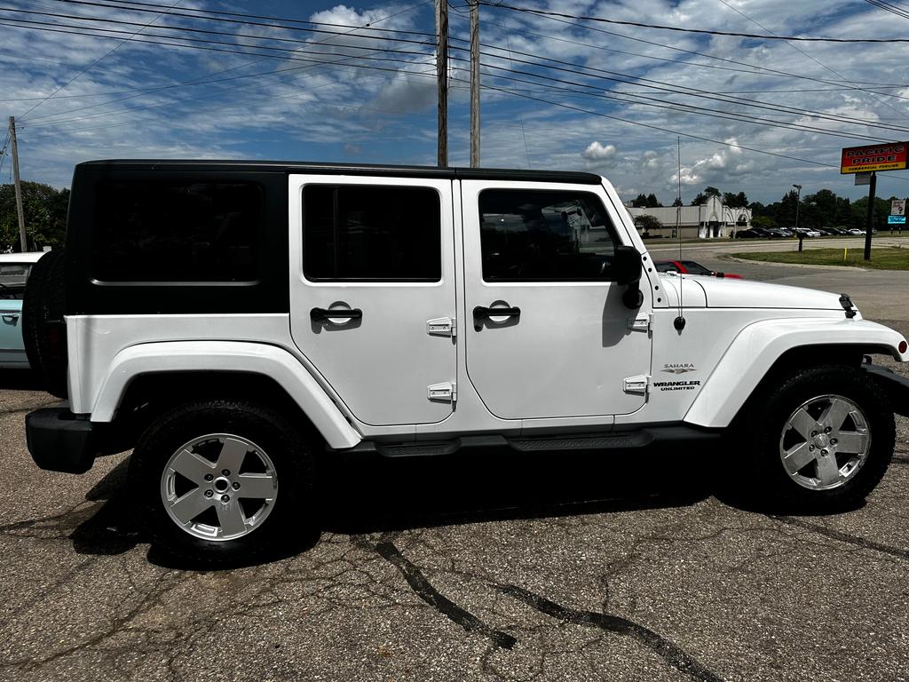 used 2011 Jeep Wrangler Unlimited car, priced at $11,900