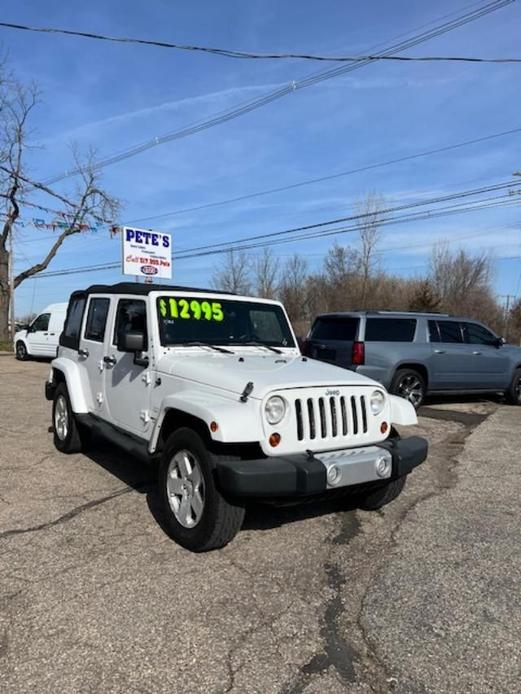 used 2011 Jeep Wrangler Unlimited car, priced at $12,995