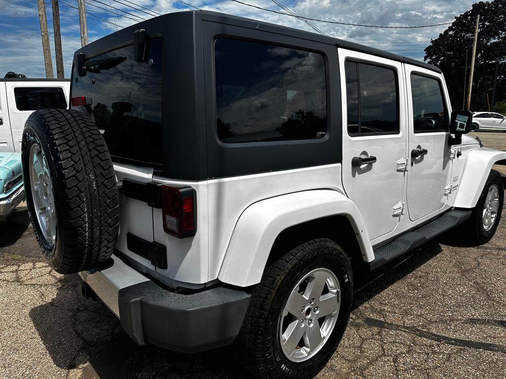 used 2011 Jeep Wrangler Unlimited car, priced at $11,900