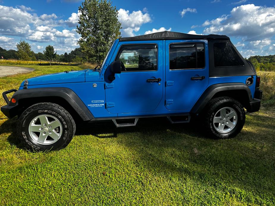 used 2012 Jeep Wrangler Unlimited car, priced at $9,995