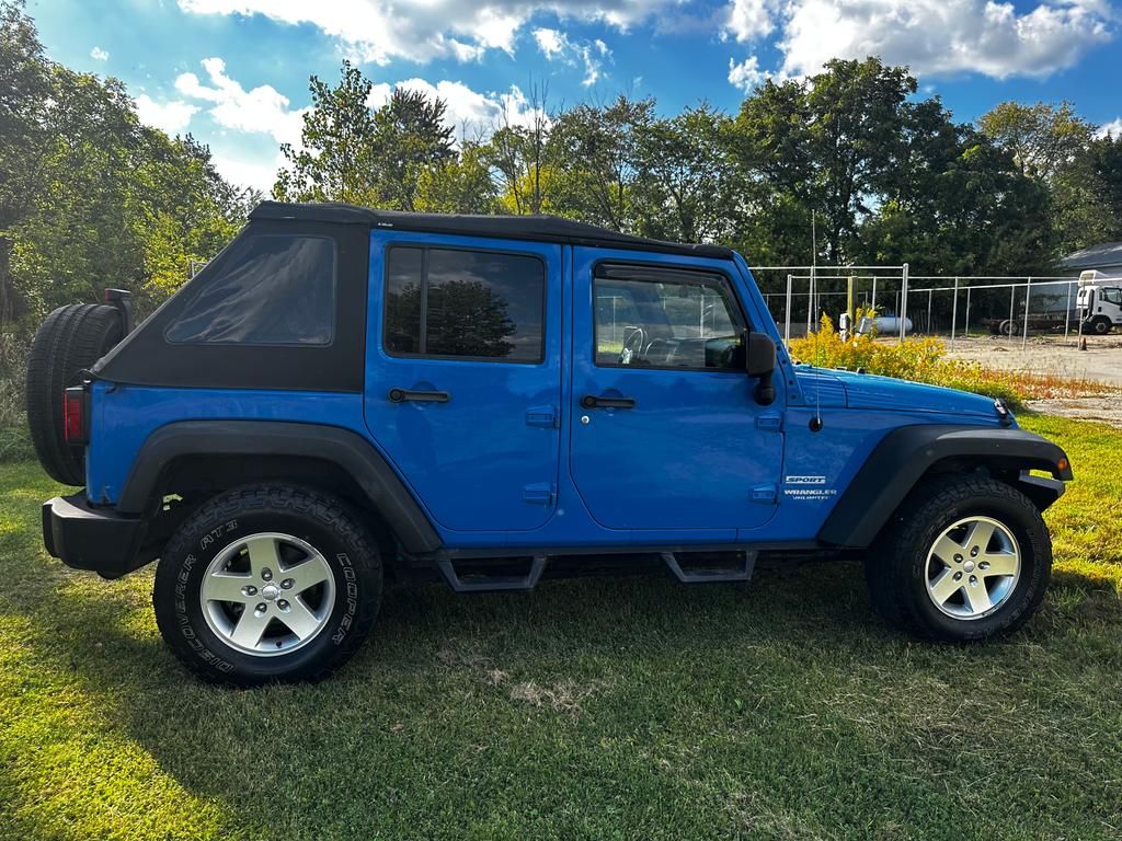 used 2012 Jeep Wrangler Unlimited car, priced at $9,995