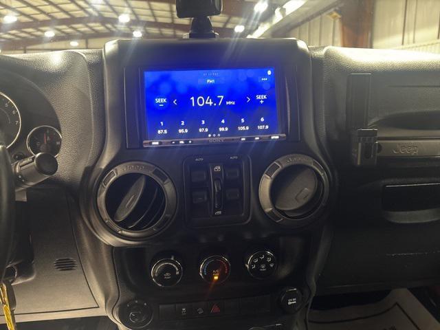 used 2015 Jeep Wrangler Unlimited car, priced at $16,979