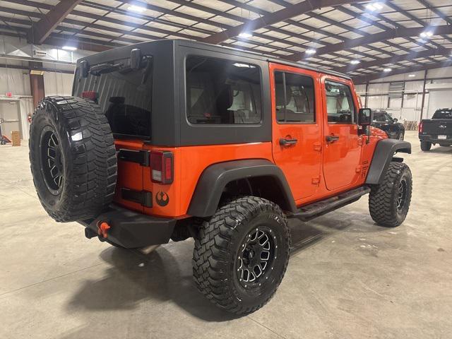 used 2015 Jeep Wrangler Unlimited car, priced at $16,979