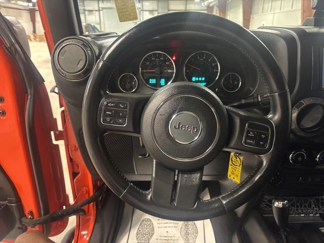 used 2015 Jeep Wrangler Unlimited car, priced at $16,979