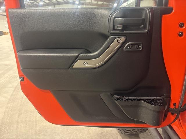 used 2015 Jeep Wrangler Unlimited car, priced at $16,979