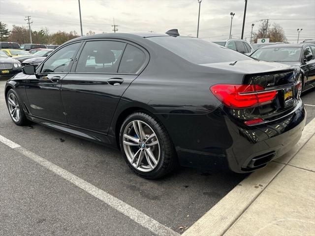 used 2016 BMW 750 car, priced at $18,985