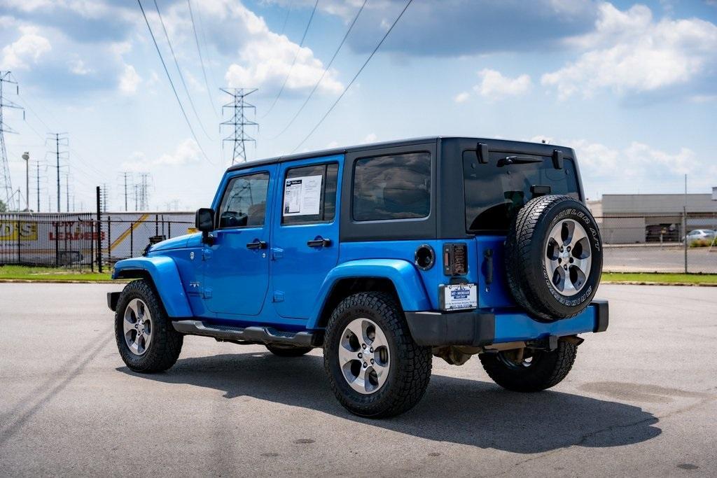 used 2016 Jeep Wrangler Unlimited car, priced at $17,471