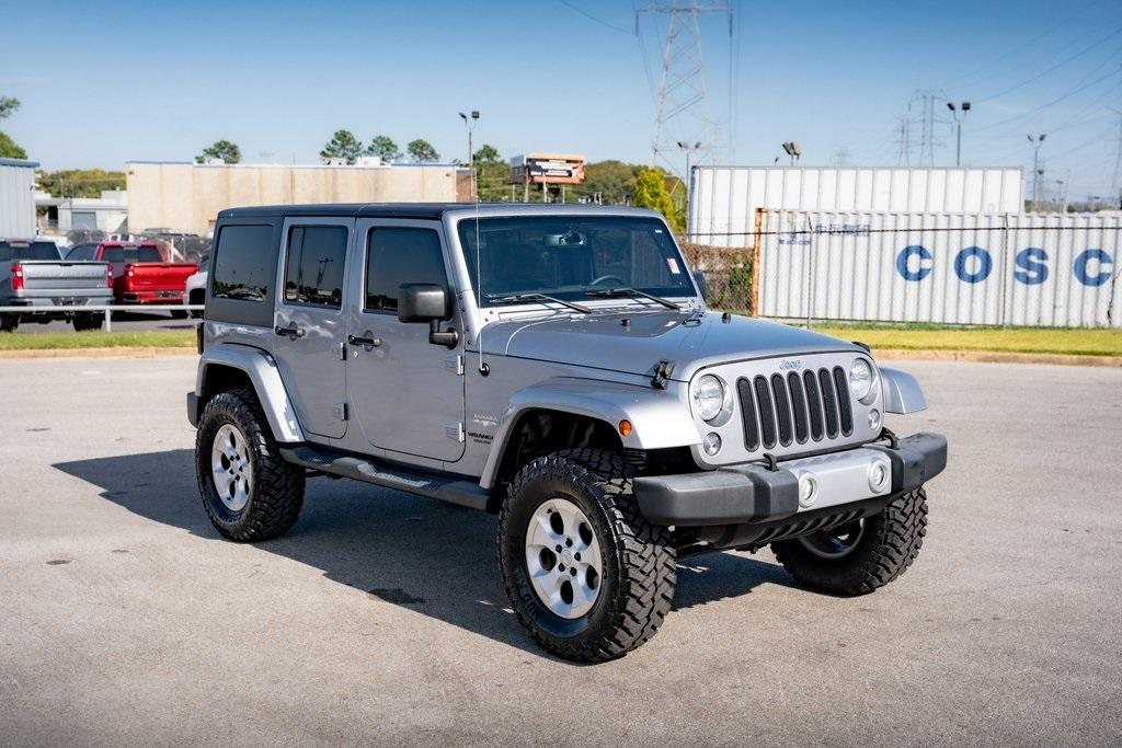 used 2015 Jeep Wrangler Unlimited car, priced at $20,456